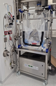 Bench Top: Flexible Glove-Box under Rigid Isolator