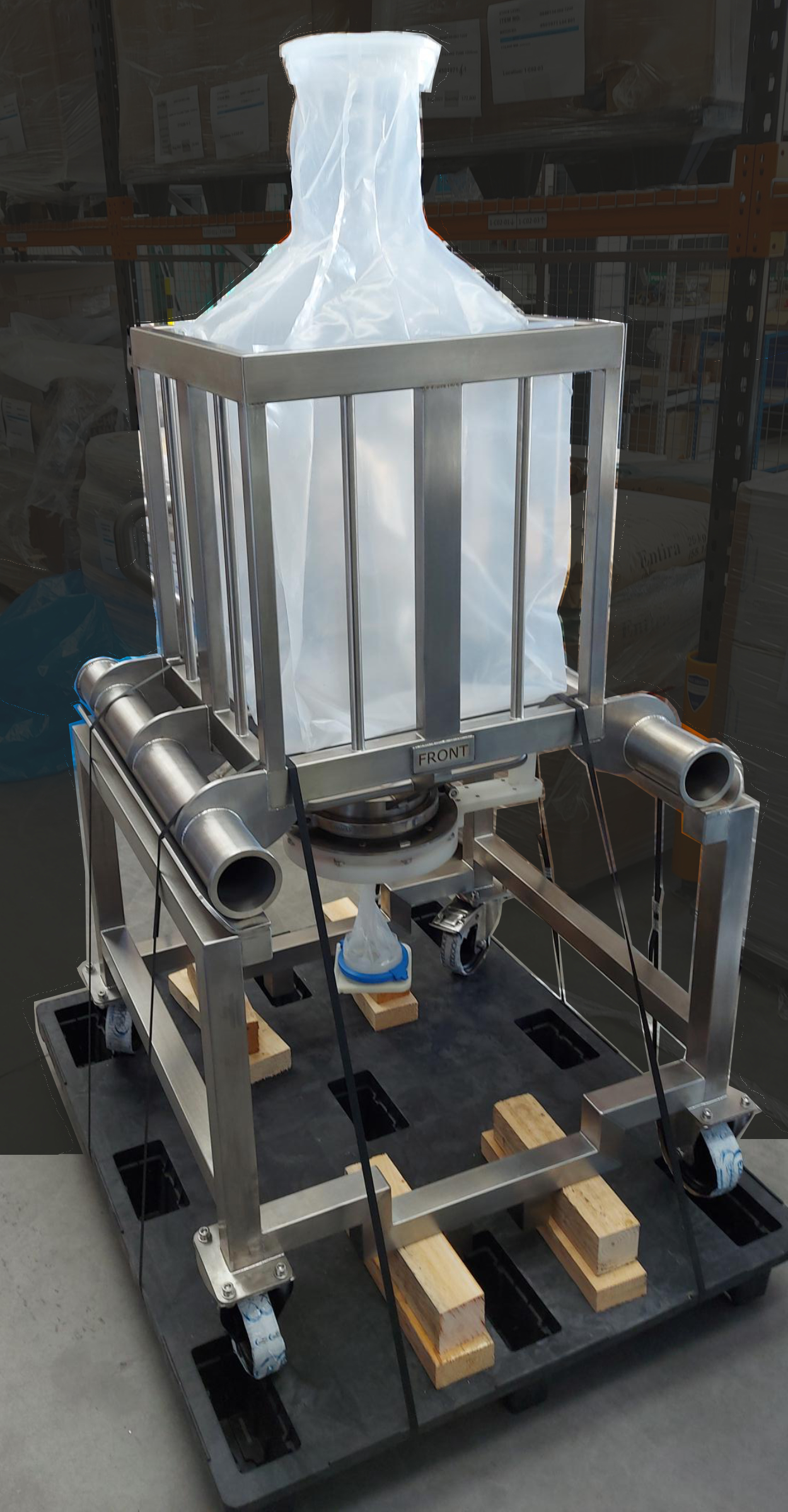 Liner in Hopper, on transport rack on wheels and section valves to control product flow.